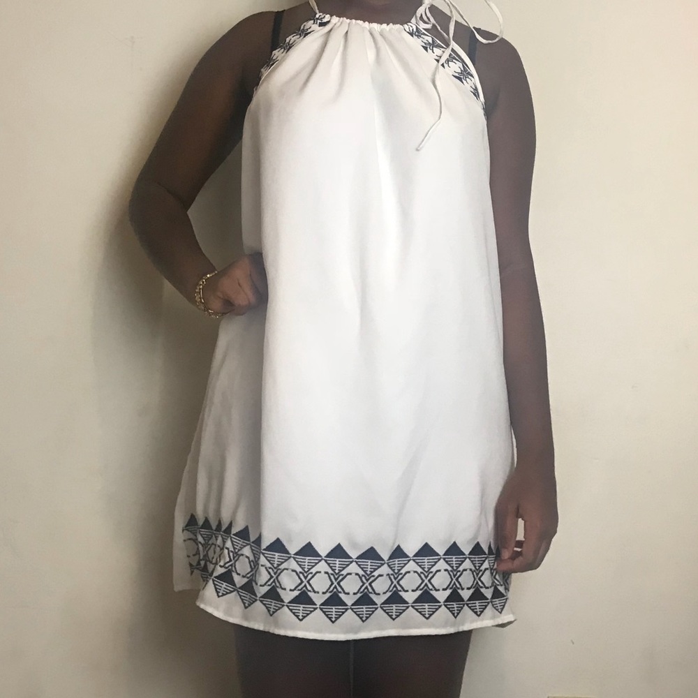 White shift dress with blue accent